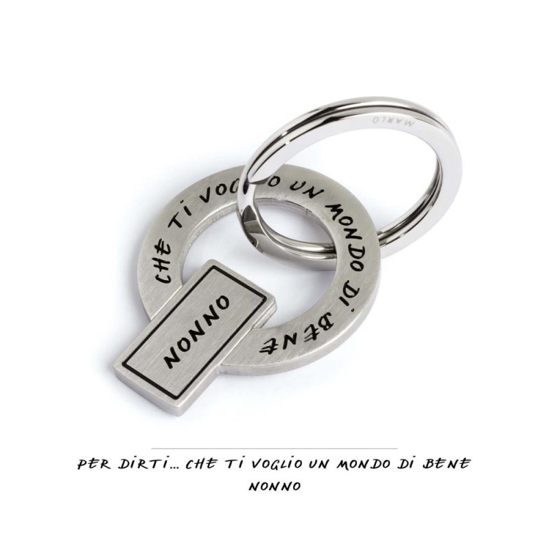 S.STEEL KEY RING S.Steel keyring, mat finishing with black enamel writting :"Per dirti ...che ti voglio un mondo di bene"Diame