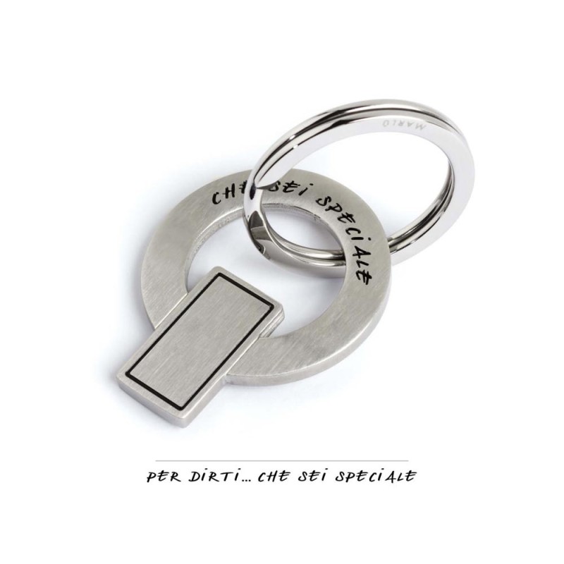 S.STEEL KEY RING S.Steel keyring, mat finishing with black enamel writting :"Per dirti ...che sei speciale"Diameter 3.2CM. N