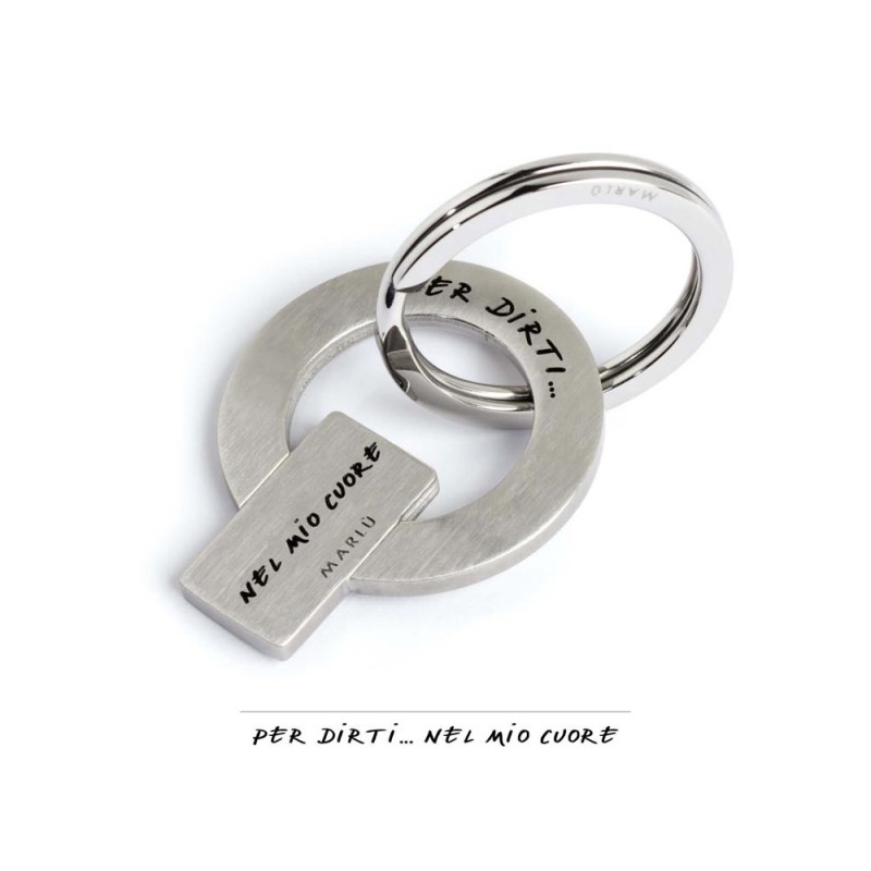 S.STEEL KEY RING S.Steel keyring, mat finishing with black enamel writting :"Per dirti ...che sei speciale"Diameter 3.2CM. N