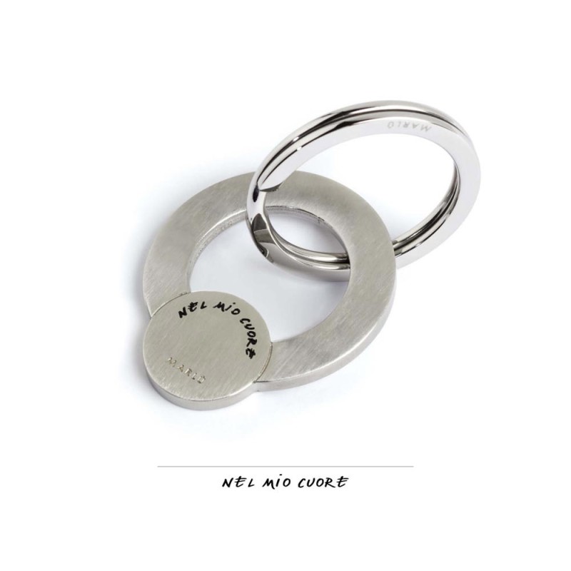 S.STEEL KEY RING S.Steel keyring, mat finishing with black enamel writting :"Per dirti ...che sei la mia famiglia"Diameter 3.2