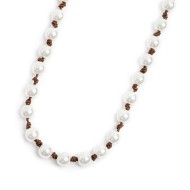 S.STEEL NECKLACE 600MM ROPE WITH PEARLS S.steel necklace with brown cotton rope 0,80 mm diameter with pearls 6,20 mm diameter. A