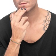 Bracciale con rondelle in pietra ed elementi in ematite