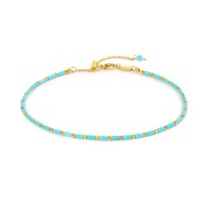 Cavigliera con perline a tubo turchesi ed ematite