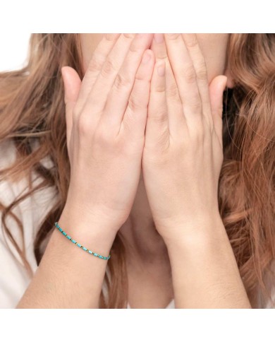 Bracciale con perline a tubo turchesi ed ematite