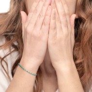 Bracciale con perline a tubo turchesi ed ematite