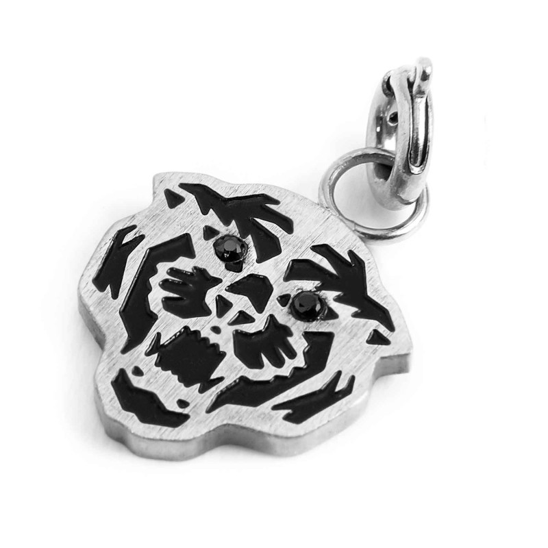 MATT BLACK OIL CHARM TIGER black oil charm tiger shape 11.20mm*11.82mm, with thickness 1.50 mm. The eyes are 2 black crystals wi