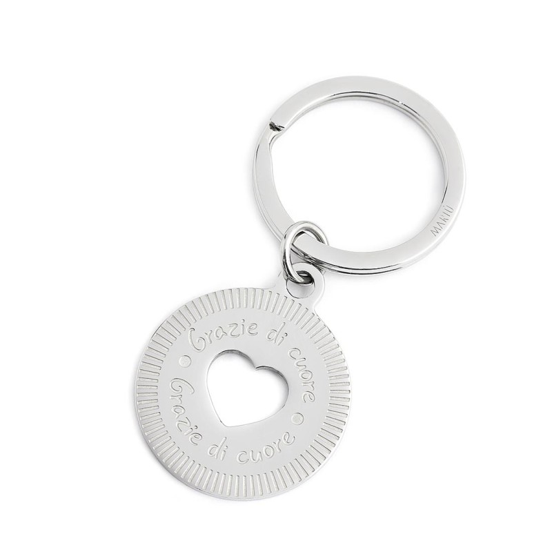 S.STEEL KEYRING WITH ROUND PENDANT "GRAZIE DI CUORE" Polished s.steel keyring with round pendant. Keyring is with 30 mm diameter