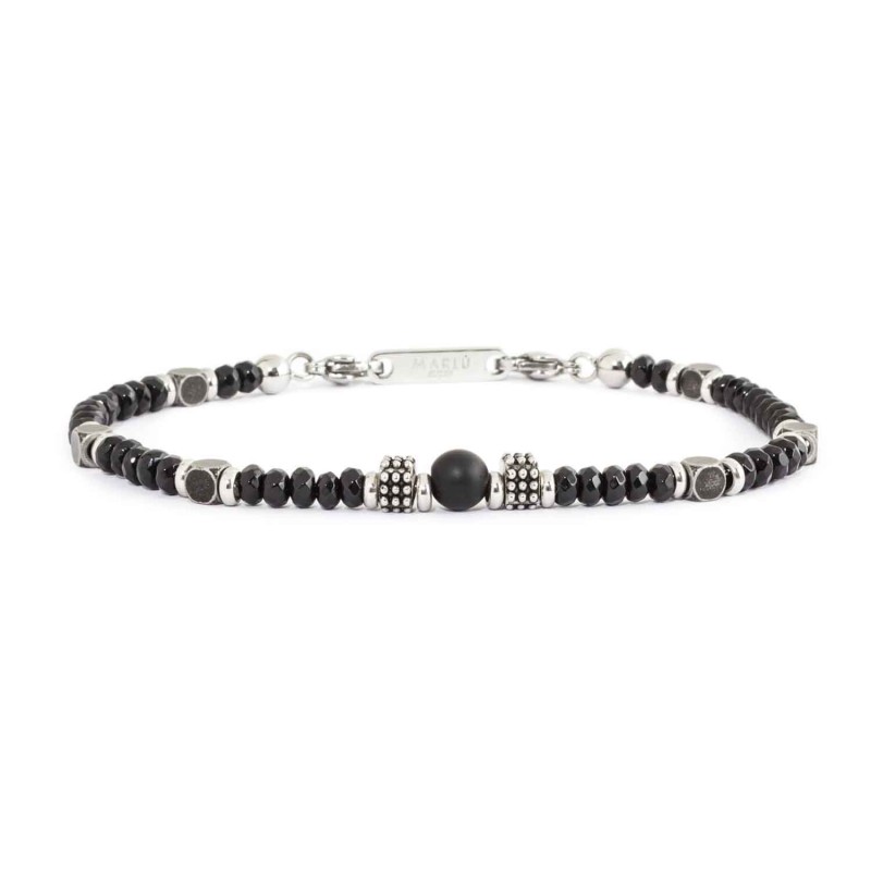 BRACELET WITH MIXED ELEMENTS Chain bracelet with nuggets in steel and burnished steel with central element in black agate. Lengt
