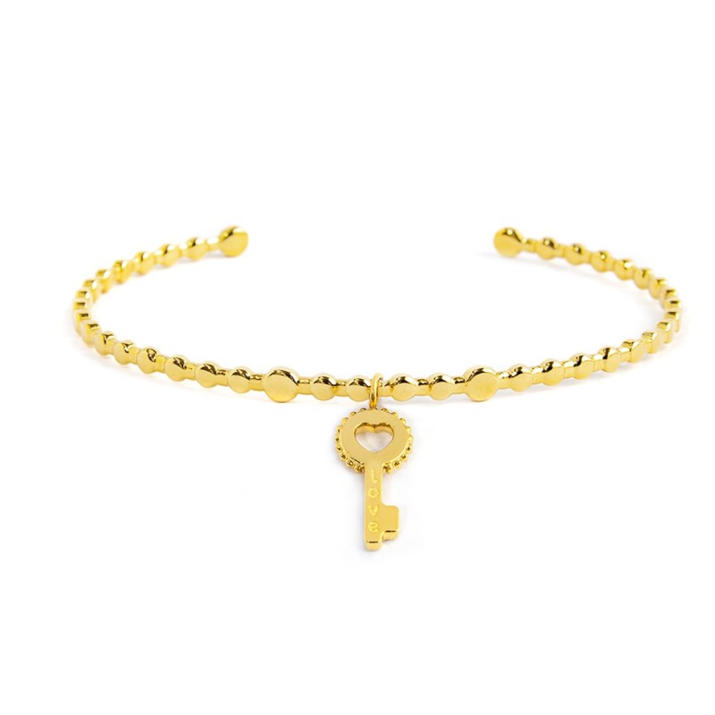 S.S.GOLD IP BANGLE WITH KEY PENDANT S.steel gold ip bangle with balls texture by stamping, size 58,80 mm (major axis)*48 mm (min
