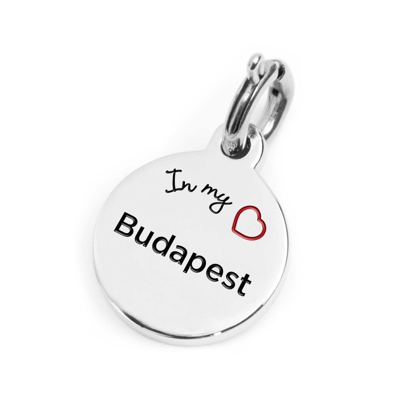 S.STEEL CHARM BUDAPEST S.steel round charm with Budapest city's symbols image, 14 mm diameter. On the front side lettering in bl